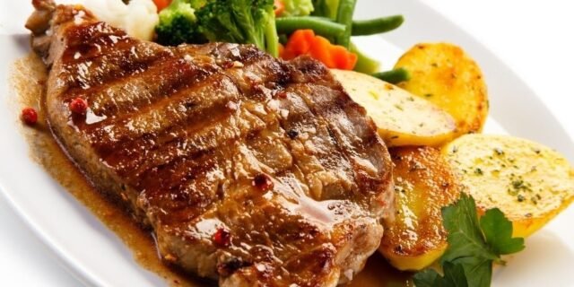Bodybuilder meal of beef steak, boiled potatoes and broccoli